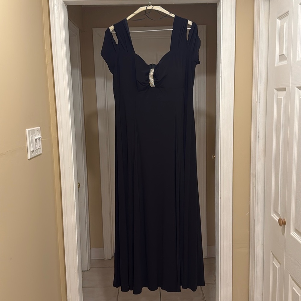Evening gown by R&M Richard’s